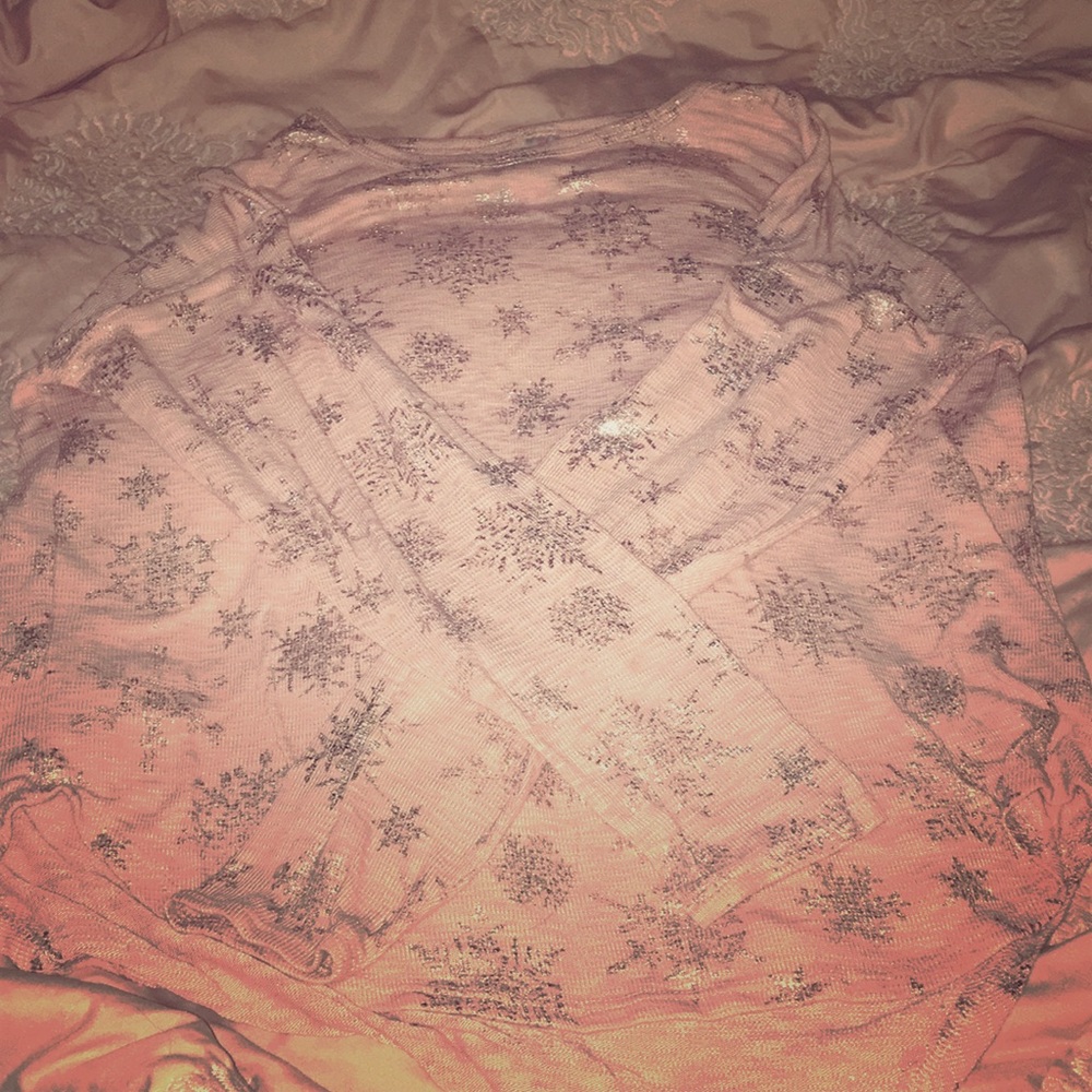 Pink tee that has silver snowflakes ❄️